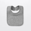 A gray cotton bandana bib for babies shown flat.