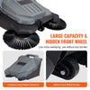 A close-up view of a gray walk-behind push floor sweeper showing its large capacity waste container and hidden front wheel de