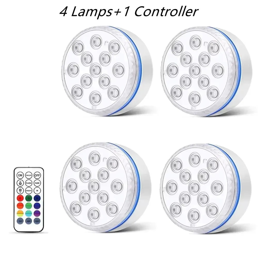 Four submersible LED pool lights and one controller for underwater lighting.
