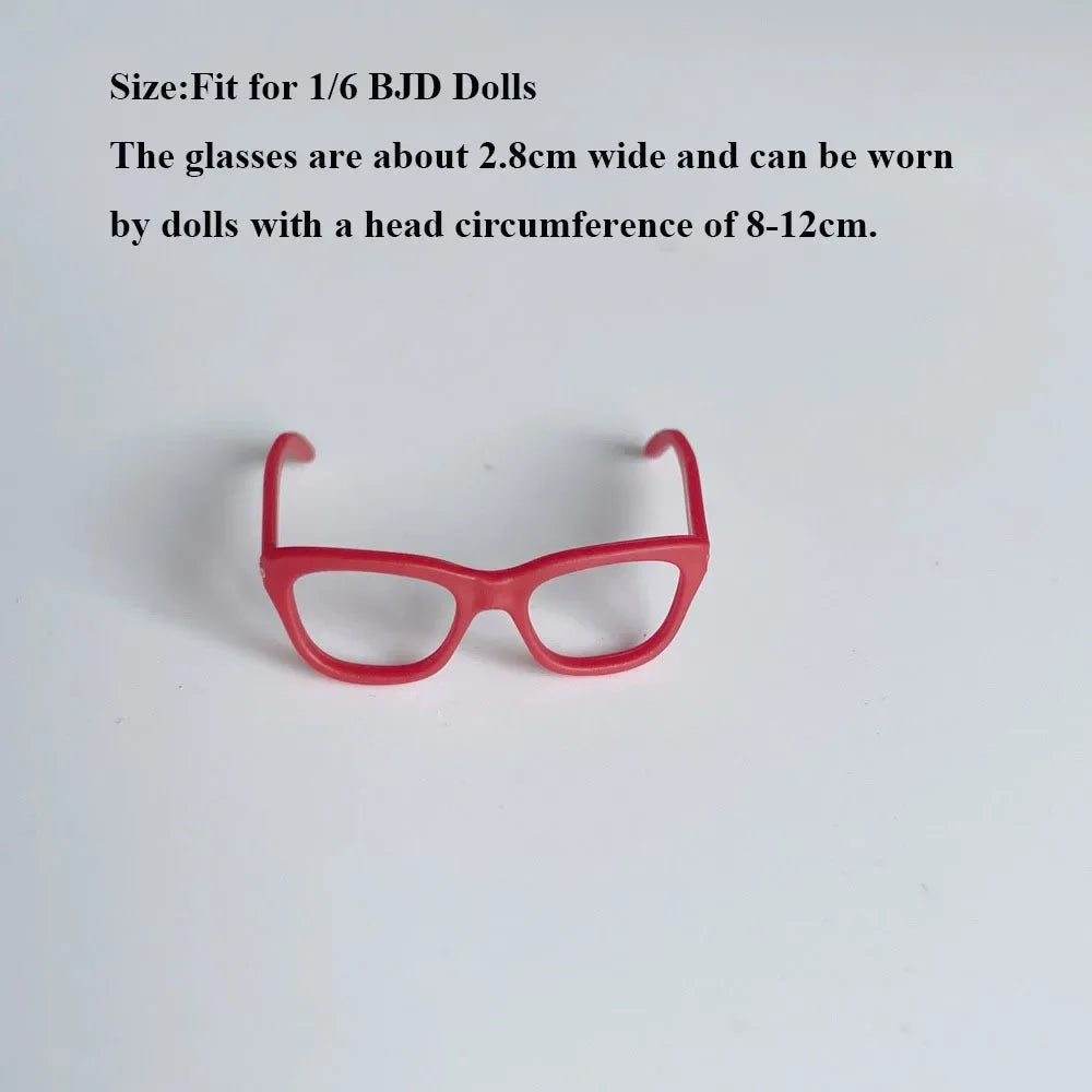 A pair of bright red, rectangular fashion doll glasses.