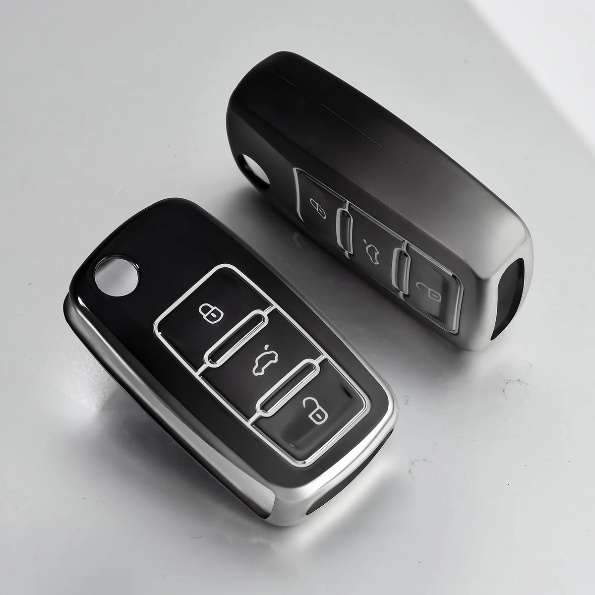 A black soft TPU car key cover for VW, Skoda, and Seat vehicles shown in a close-up view.