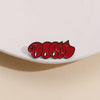 A red enamel pin featuring the text MF DOOM in a bubble font.