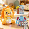 A yellow lion musical toy with lights and a purple elephant musical toy sitting on a wooden table.