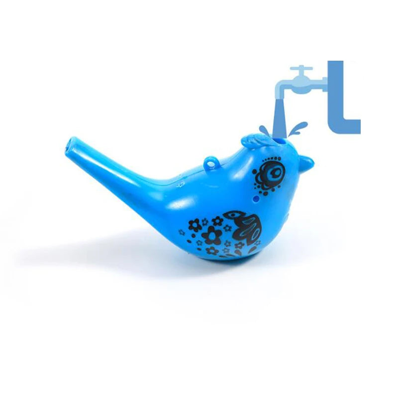 A bright blue plastic novelty bird whistle with black floral designs, shown next to a faucet.