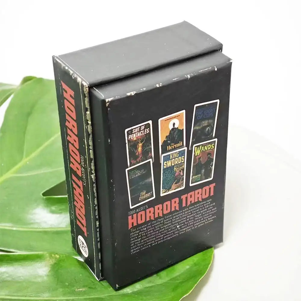 A black box of the Horror Tarot card deck with illustrations of various macabre themes.