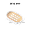 A white soap box with a wooden bamboo dispenser featuring three parallel slots for soap.