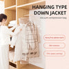 A hanging type down jacket is shown inside a vacuum compression bag on a wooden hanger.