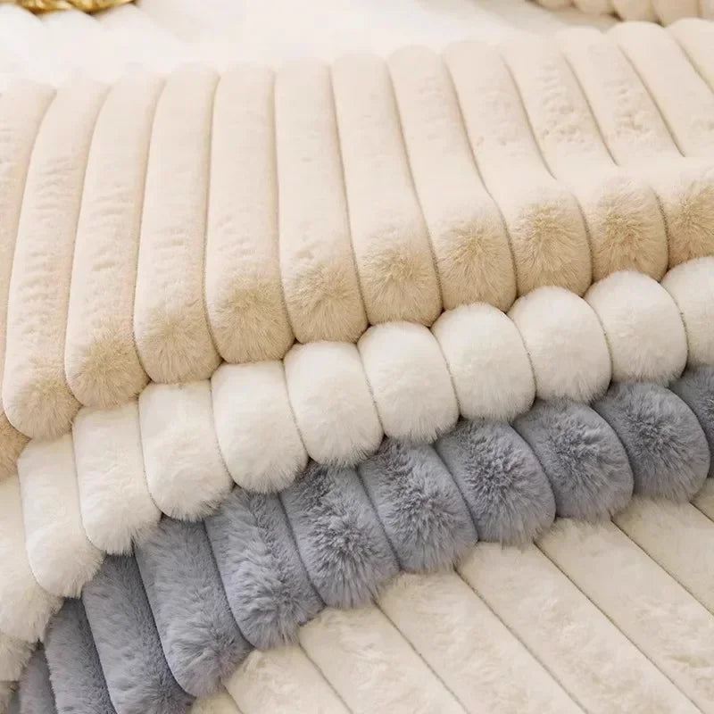 A close-up of a cozy plush anti-slip sofa cushion mat featuring horizontal stripes in cream, beige, and gray faux fur.
