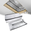 Silver insulation cover for an attic stairway, showing a sealed barrier and wooden framing.