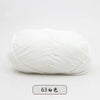 A ball of white 4-ply milk cotton yarn for knitting and crochet