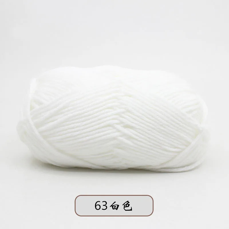 A ball of white 4-ply milk cotton yarn for knitting and crochet