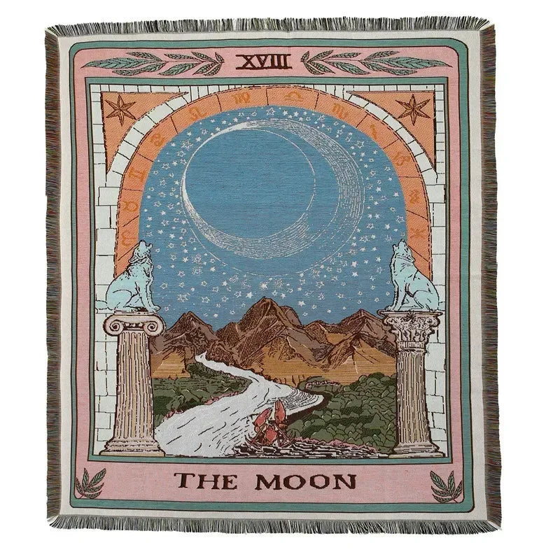 A rectangular woven throw blanket featuring a celestial design with a moon, mountains, and lions.