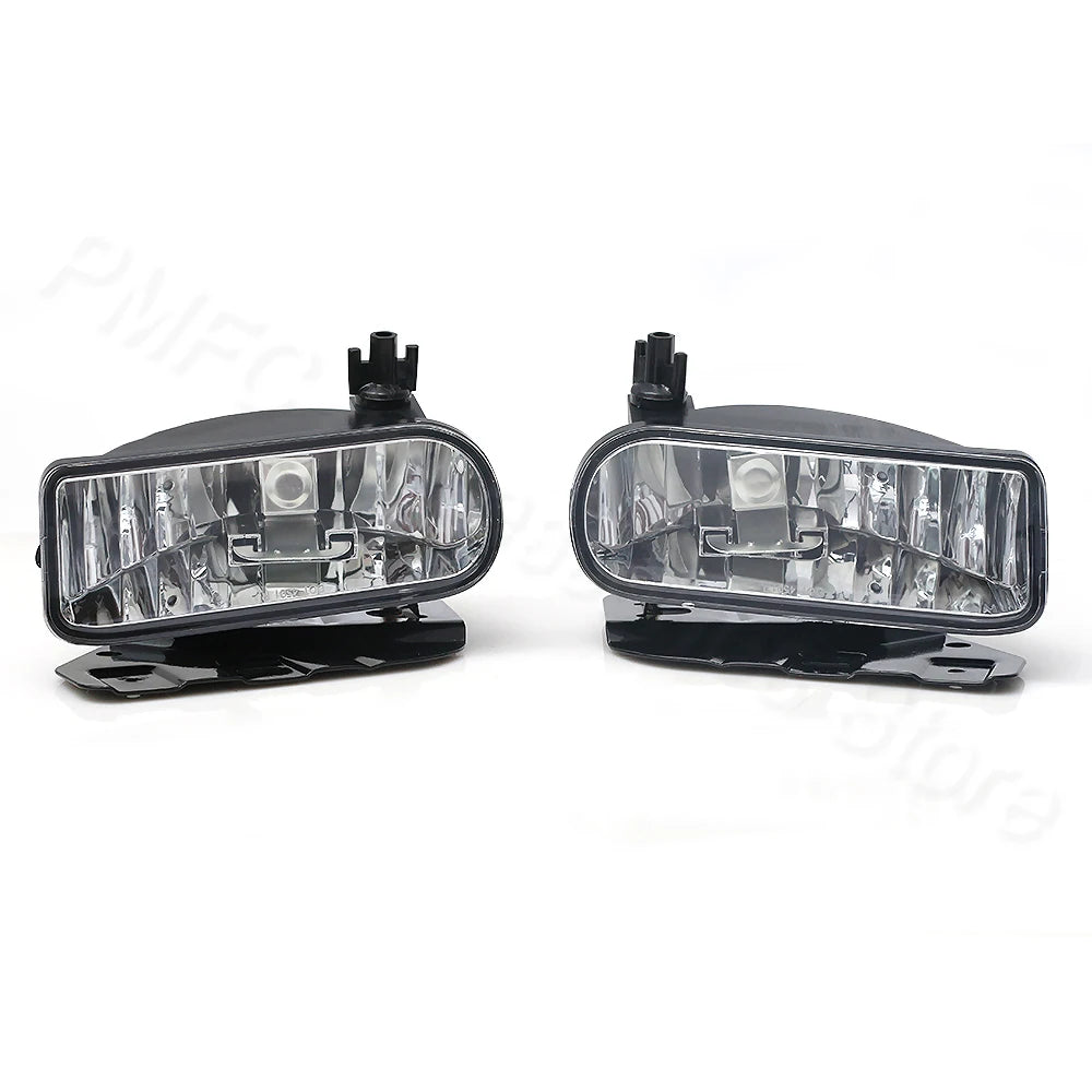 Black front fog light assembly for Cadillac Escalade, featuring clear bulbs and a mounting bracket.