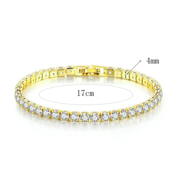 A close-up view of a 14K gold-plated CZ tennis bracelet and bangle set with small diamonds.
