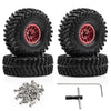 Set of four black metal beadlock RC crawler wheels with tires and mounting hardware