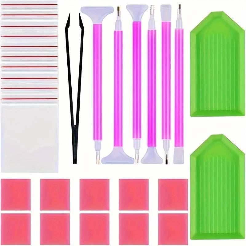 A collection of diamond painting accessories including applicators, pens, and green painting mats.