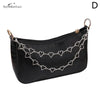 Black faux leather clutch bag with a multi-layer silver chain strap and heart pendant charms