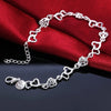 Pulsera de Cadena Corazón y Flor en Plata de Ley