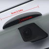 A black universal car rear camera rain cover shield is shown mounted on a white surface with dimension markings.