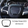 Carbon fiber interior trim kit for Dodge Charger featuring a replacement steering wheel button cover.
