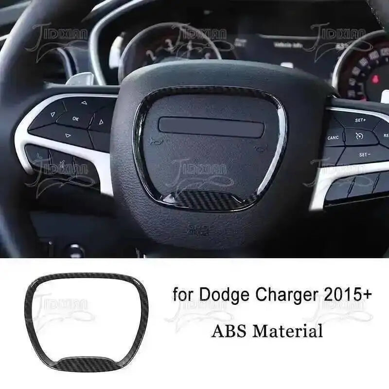 Carbon fiber interior trim kit for Dodge Charger featuring a replacement steering wheel button cover.