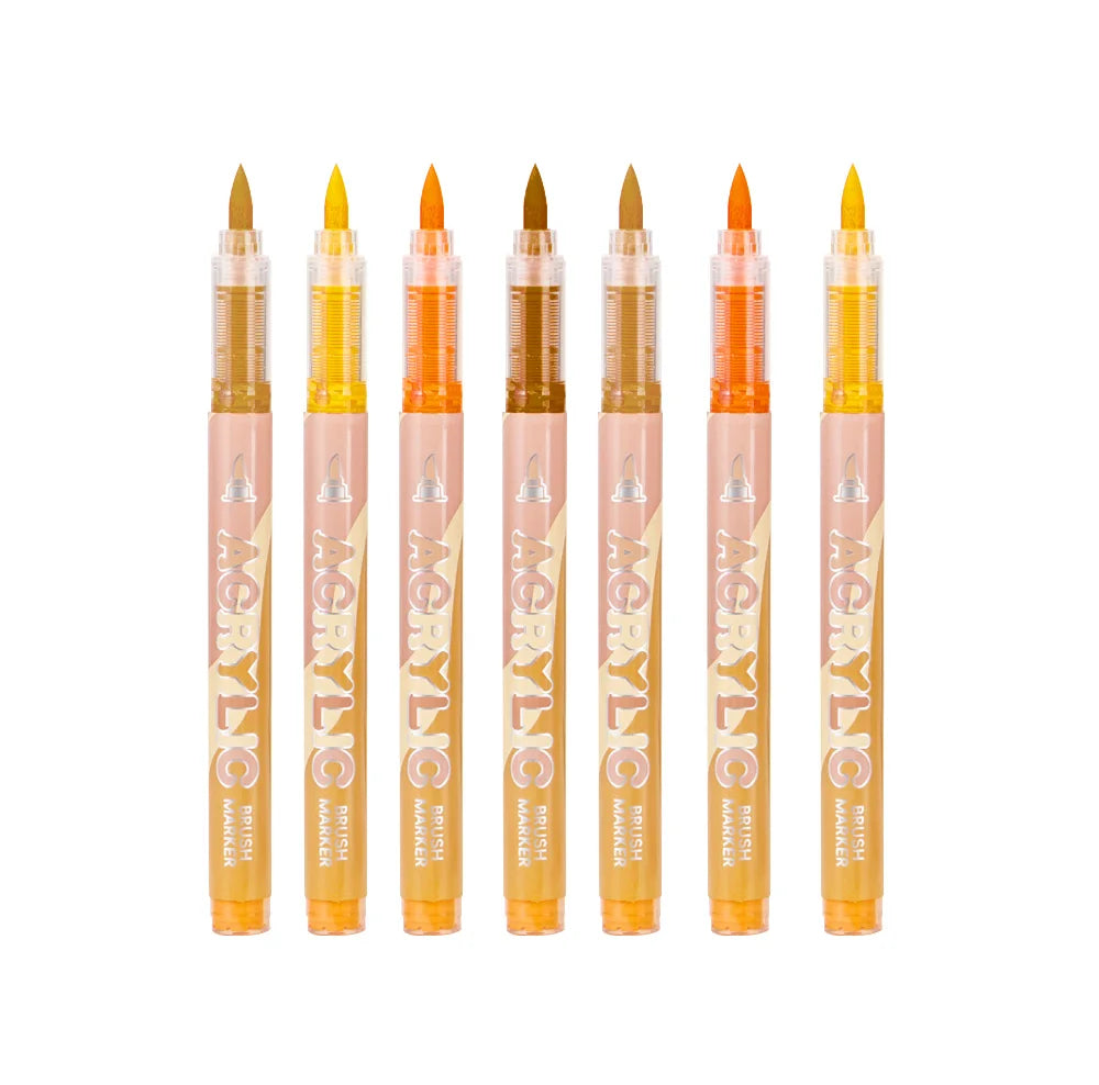 A set of twelve acrylic paint markers in various shades arranged in a row.