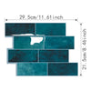 A rectangular mosaic of teal blue self-adhesive PVC tiles used as wall stickers.