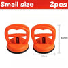Two orange heavy duty car dent puller suction cups with 65mm length and 55mm width