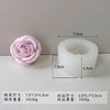 A white silicone mold shaped like a rose is shown next to its finished product, demonstrating the size difference.