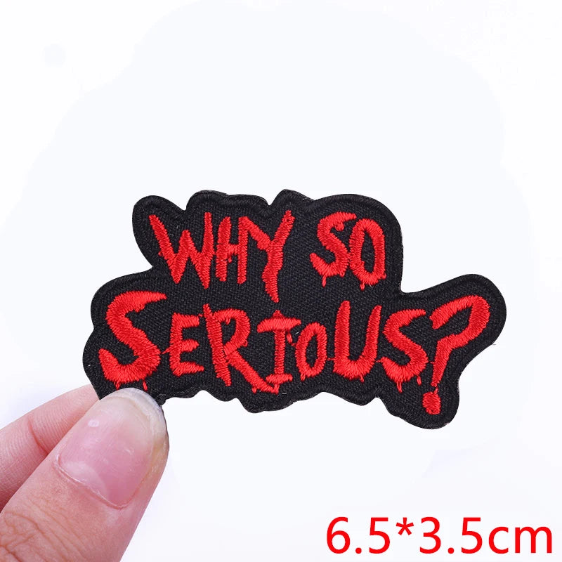 Black embroidered iron-on letter patch with red text asking Why So Serious?