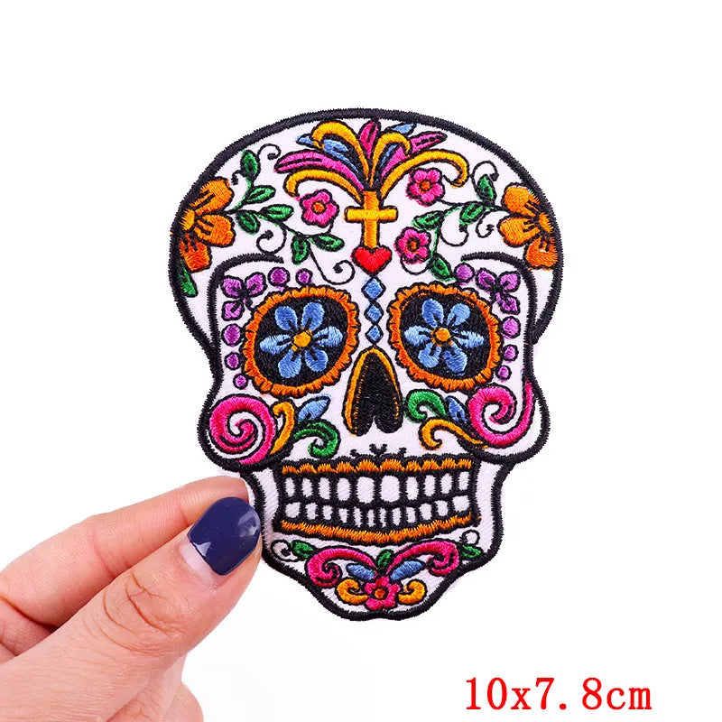 Embroidered rose skull patch with iron-on backing featuring vibrant floral designs and a skull motif