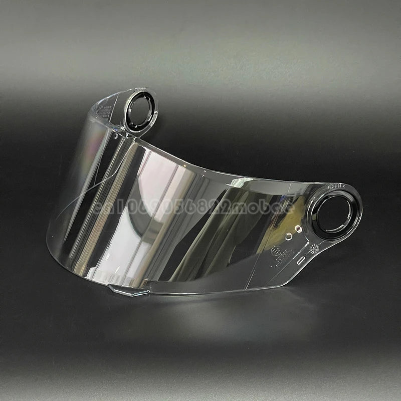 Clear plastic replacement motorcycle helmet visor shown from a slight angle.