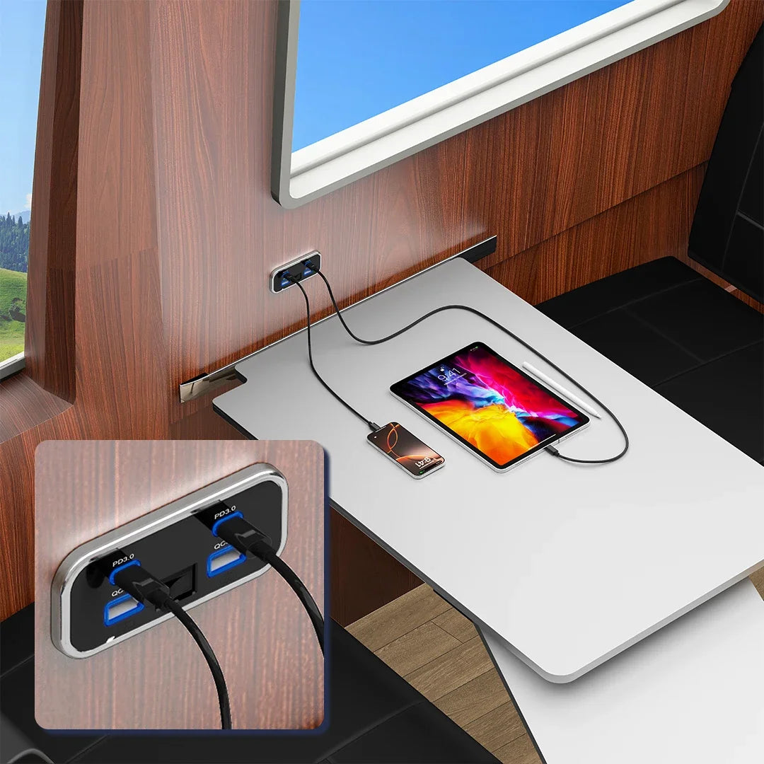 A white desk features a 4-port USB power outlet with PD 3.0 and QC 3.0 fast charging ports.
