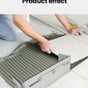 Hands apply adhesive to a tile using an adjustable notched trowel on a floor surface.