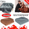 A set of cozy waterproof throw blankets in brown and gray textures shown alongside a model.