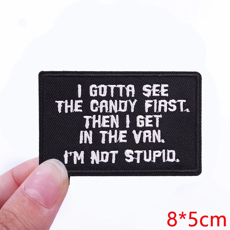 Black embroidered iron-on letter patch with white text that reads I GOTTA SEE THE CANDY FIRST THEN I GET IN THE VAN I'M NOT S