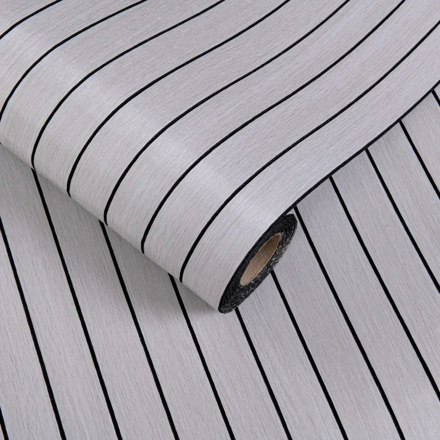 Roll of 3D grille pattern peel-and-stick wallpaper with vertical black lines on a light gray background