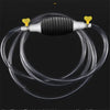 A manual siphon pump with a black ribbed body and yellow connectors is shown connected to clear tubing.
