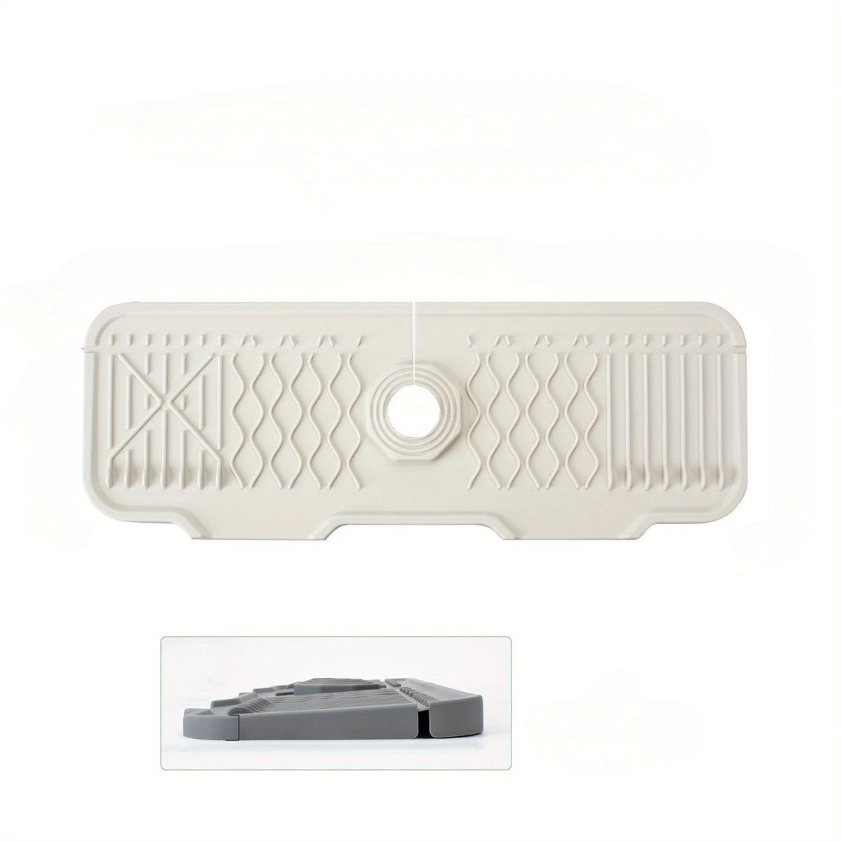 A beige silicone faucet splash guard with a foldable edge and decorative patterns.
