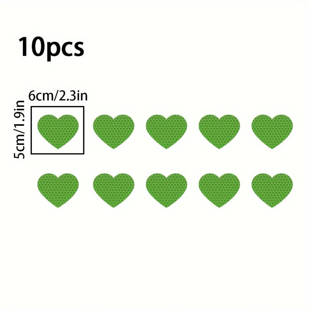 Ten green heart stickers for night safety and car decoration, measuring 6cm or 2.3 inches each.
