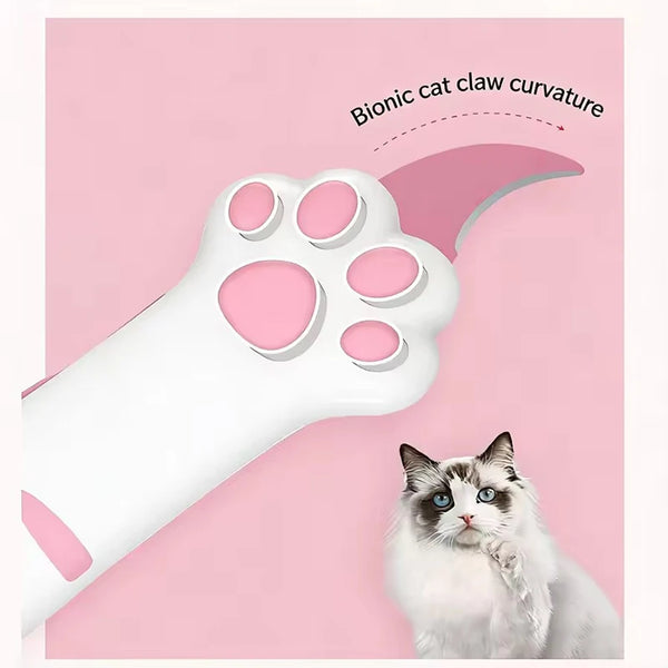 Un cutter blanc en forme de patte de chat à côté d'un chat domestique.