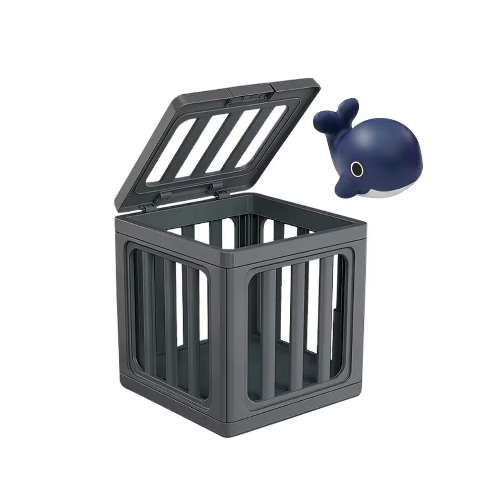 A dark gray plastic diving toy featuring a dolphin figure and a square container for play.