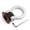 A silver decorative hook and mounting bracket for a car trailer.