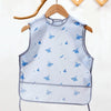 Light blue waterproof full-body baby feeding bib with a sleeveless design featuring small blue bird illustrations