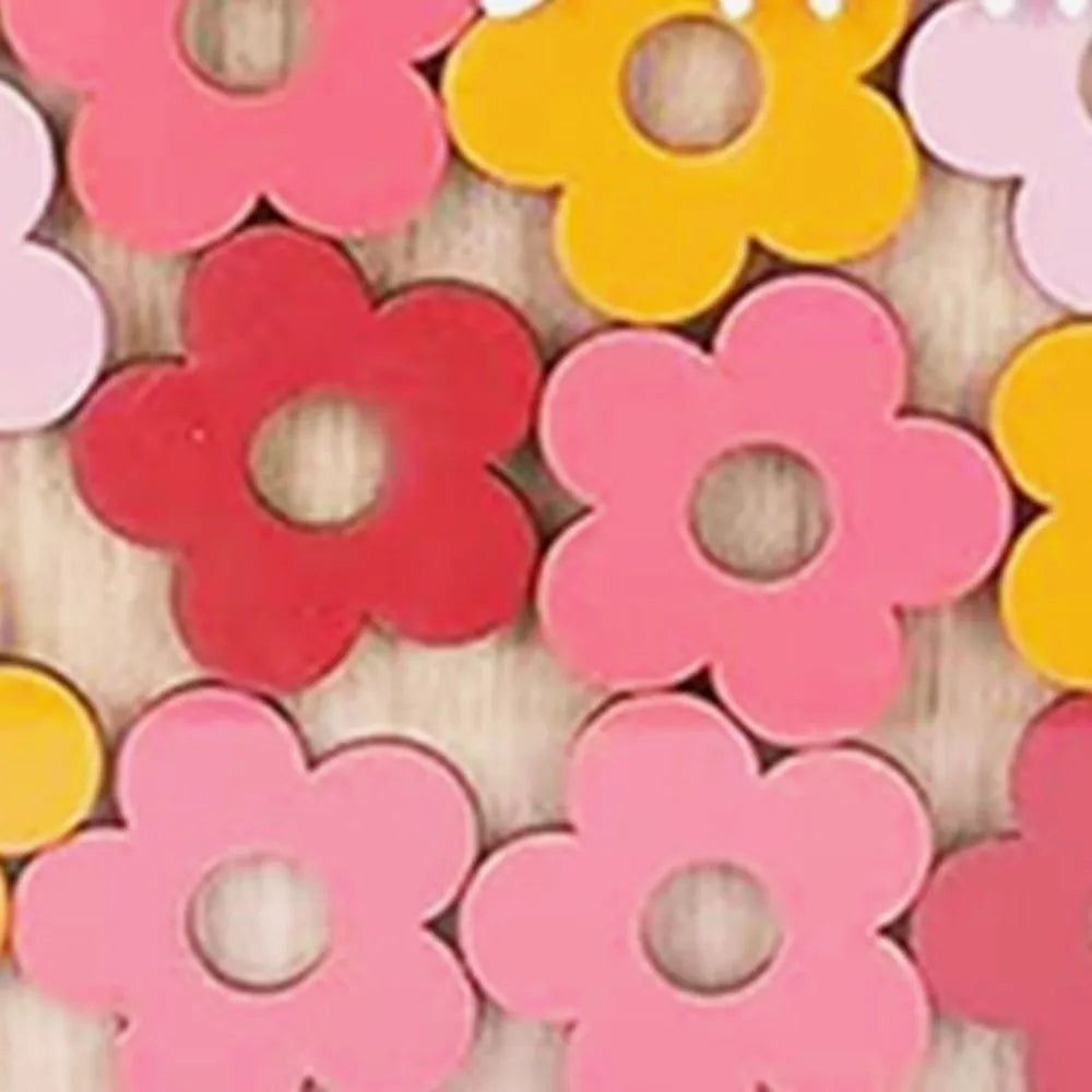 Assortment of colorful wooden flower shapes used as a cartoon reward jar for positive behavior