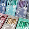 A collection of seven minimalist clear gel pens in various shades including mint, olive green, and purple.