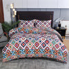 A patterned boho striped geometric duvet cover set featuring intricate diamond and chevron designs.