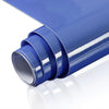 A roll of blue waterproof self-adhesive marble wallpaper, showing a close-up view of the rolled material.