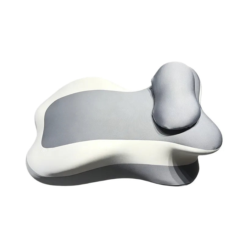 A light gray and white multi-positional memory foam body pillow with a removable cover.