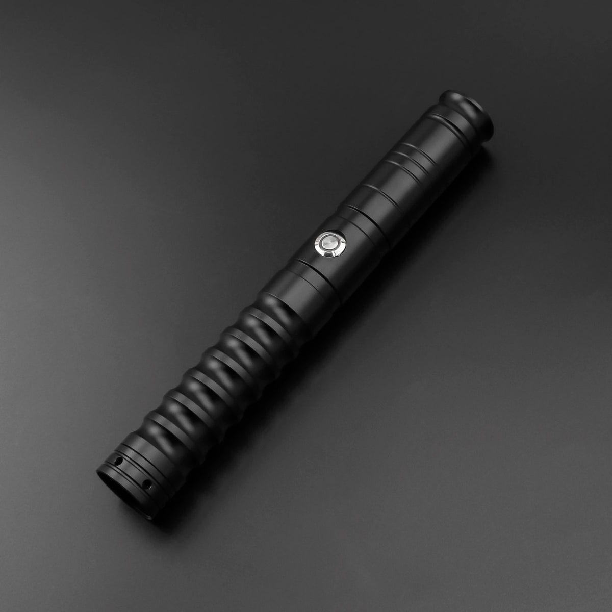 Black metal hilt of an RGB heavy dueling lightsaber with a visible metal ring detail.